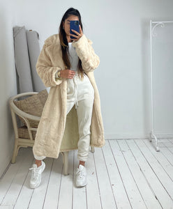 Faux fur longline oversized coat with large buckle in Creme Caramel